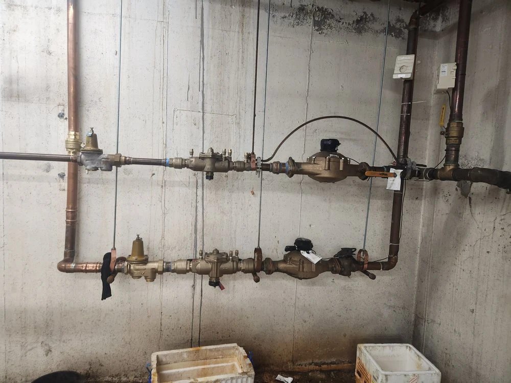 Commercial tankless water heaters and three-basin sink installation